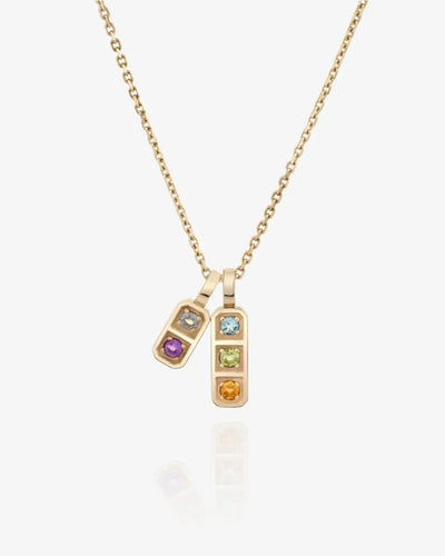 Gold Sutton tag necklace with two small rectangular tags set with birthstones, on a fine chain, shown flat