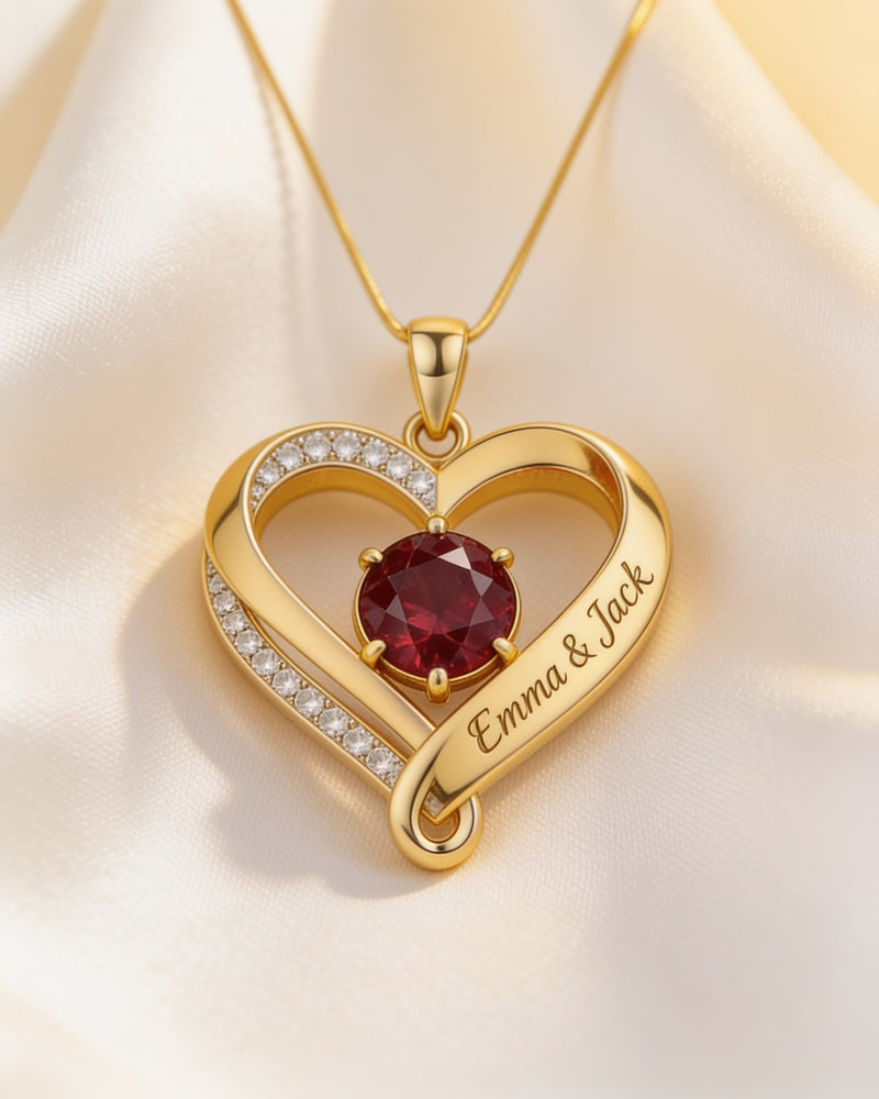 Forever and Always Birthstone Infinity Heart Necklace in gold with a ruby-colour July birthstone, engraved Emma & Jack