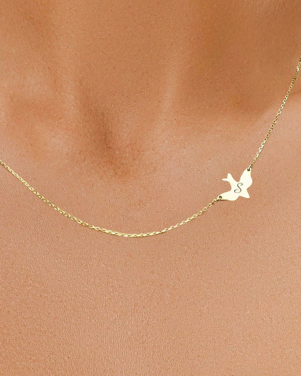 Gold necklace with a dove pendant on a person's neck - CG2028S,CG2030S,CG2032S