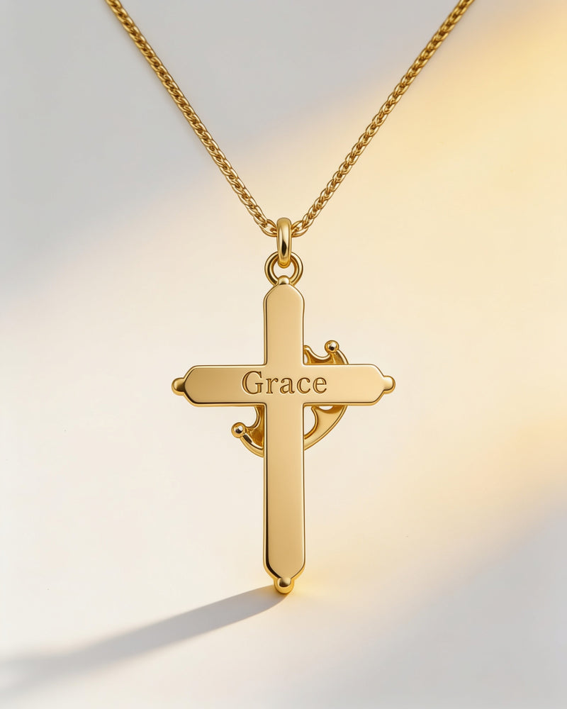 Back of the gold Crown Cross Necklace with a free engraving reading Grace