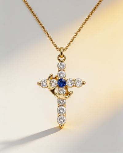 Birthstone Crown Cross Necklace in gold with sapphire centre stone