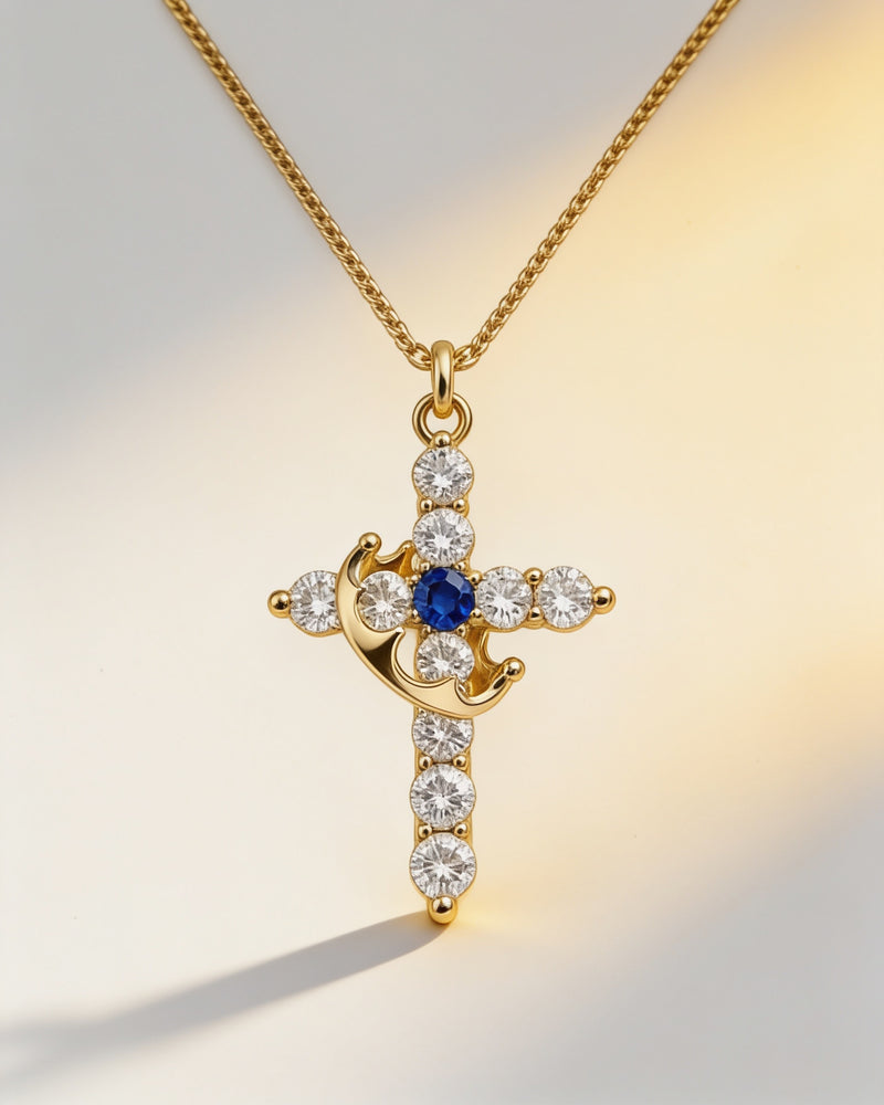 Birthstone Crown Cross Necklace in gold with sapphire centre stone