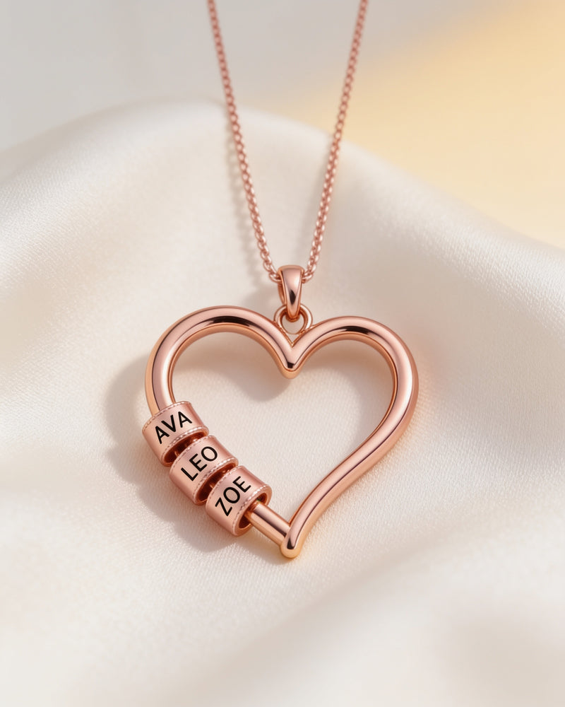 Heart of the Family Name Bead Necklace in rose gold with three engraved name beads, Ava, Leo and Zoe