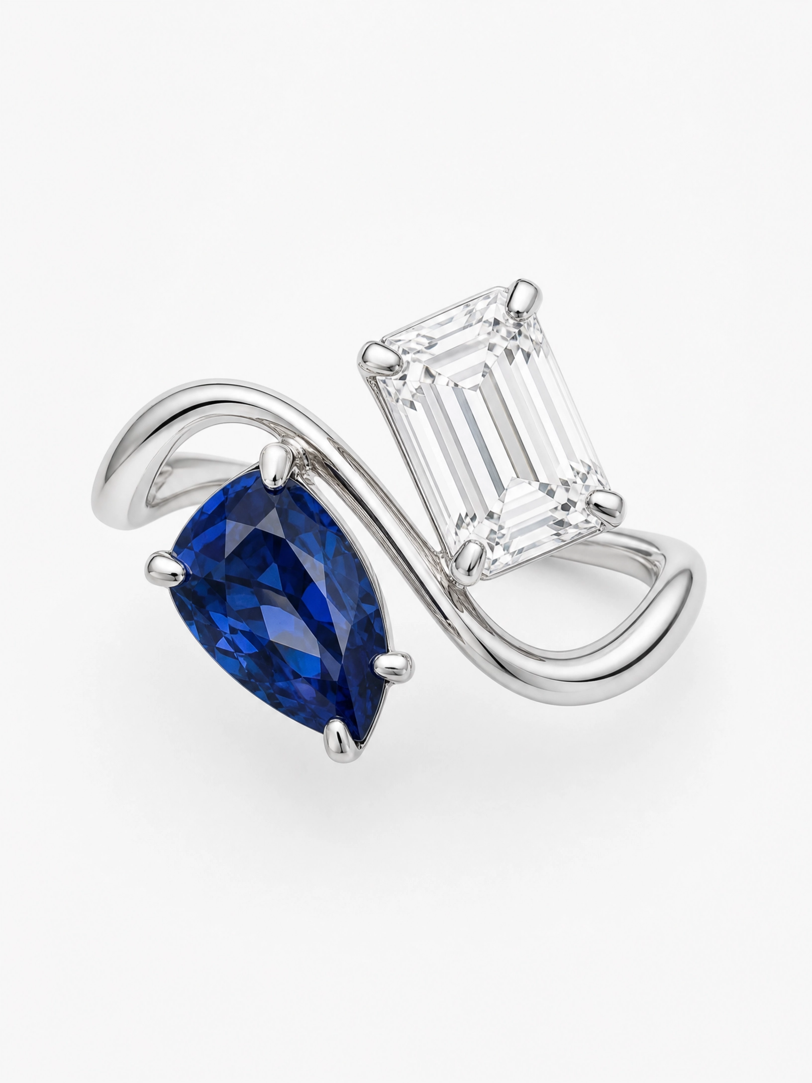 Personalized two-birthstone ring in silver with sapphire and diamond stones, pear and rectangle cuts